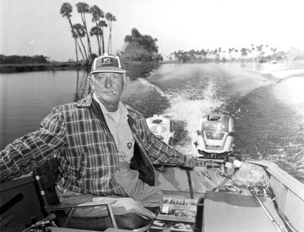 Larry Aubrey speeding up his boat on the Saint Johns River - Seminole County, Florida