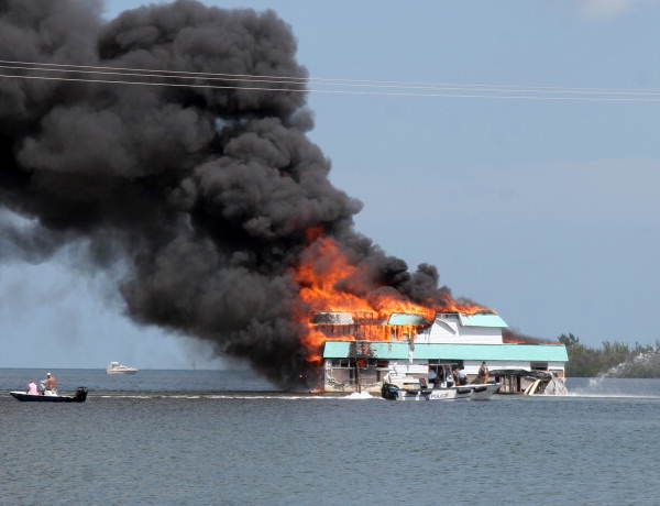 Abandoned house boat fire off Hilton Haven.