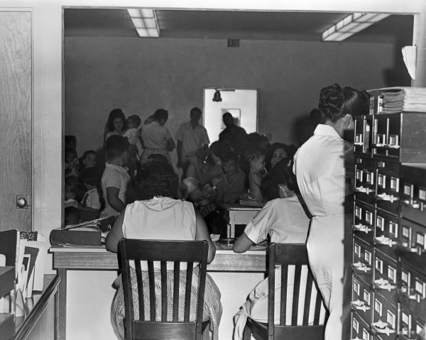 Cuban nurse at pediatric clinic - Miami, Florida