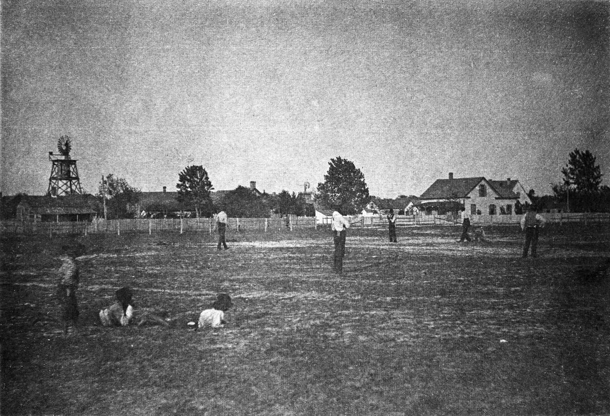 Boys watching baseball game - Apalachicola, Florida