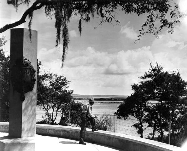 A park ranger viewing the St. Johns River from the Ribault Monument at the Fort Caroline National Memorial - Jacksonville, Florida
