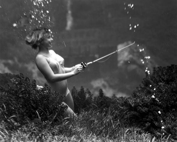 Dot Fitzgerald "fishing" underwater - Weeki Wachee Springs, Florida