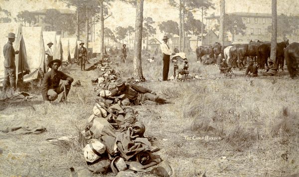 Camp barber at work during the Spanish-American war