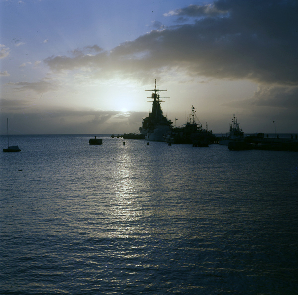 Silhouettes of ships shown during sunset in Sarasota, Florida.