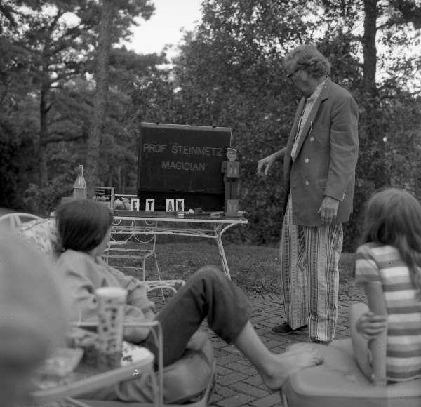 Joe Steinmetz performing a magic trick in Massachusetts.