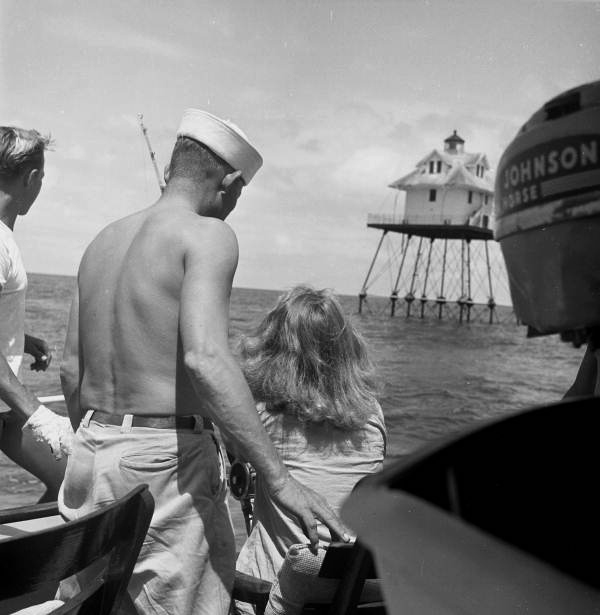 View showing the photographer's daughter Lois Duncan Steinmetz fishing from aboard the charter boat "Tramp".
