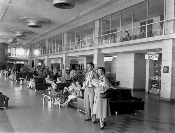 Lois Foley Steinmetz and William Janney Steinmetz, wife and son of Sarasota photographer Joe Steinmetz, in the Seattle Airport terminal.