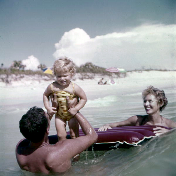 Nelson family in the Gulf with a raft near Sarasota, Florida.
