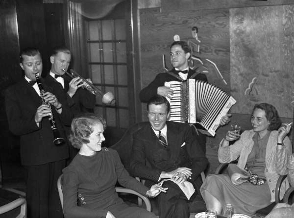 View of guests and musicians aboard the S.S. Florida of P. & O. Line traveling between Miami and Havana.