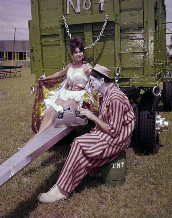 View showing aerialist Carmen del Molino with Bob-O the clown on the grounds of the Circus Hall of Fame in Sarasota, Florida.