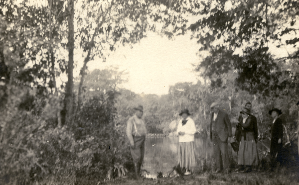 Postcard showing people on Koreshan Unity property in Estero, Florida.