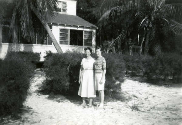 Koreshan Unity member Hedwig Michel, left, with a guest on Christmas day - Fort Myers Beach, Florida.