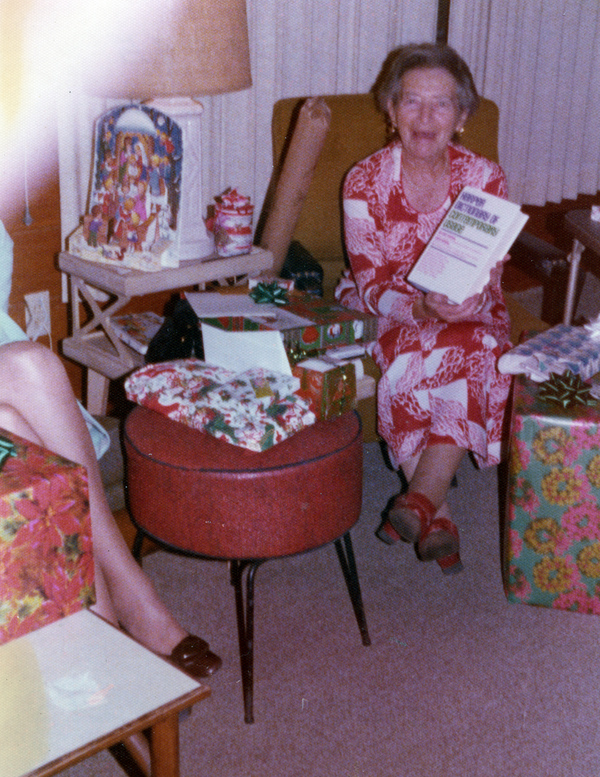 Koreshan Unity president Hedwig Michel with gifts on Christmas day.