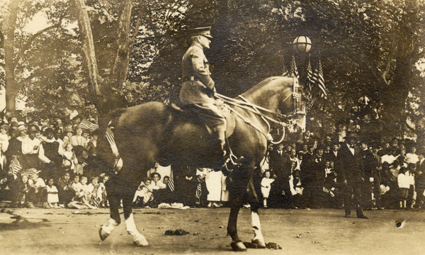 General Pershing on horseback in a parade at Washington, D.C.