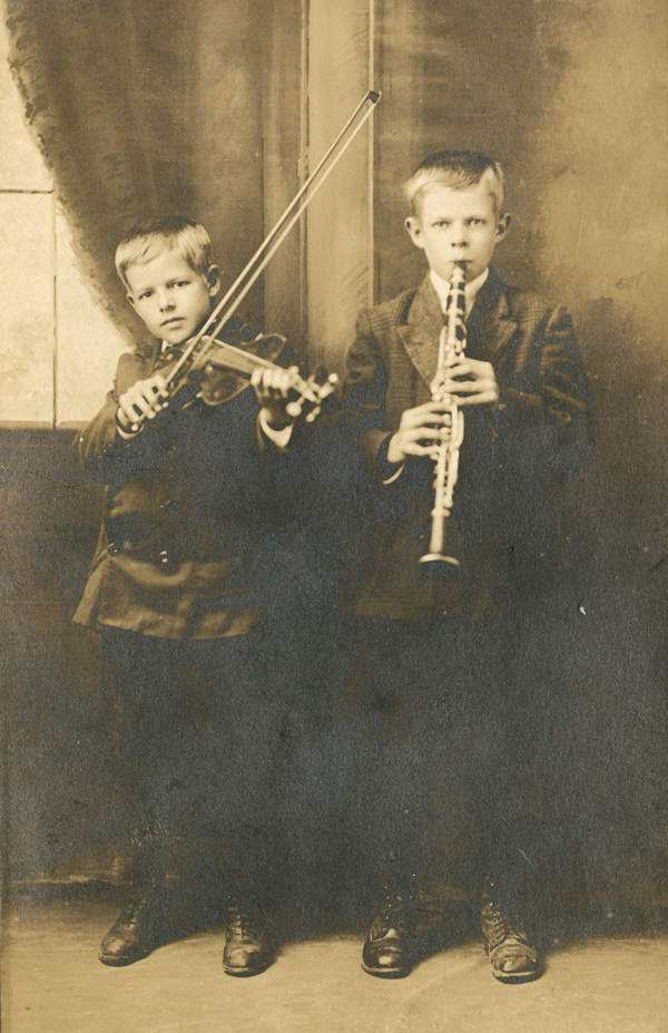 Postcard showing two unidentified young Koreshan Unity musicians in Estero, Florida.