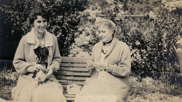 Koreshans Imogene Bubbett Rahn, left, and Eleanor Castle sewing together.