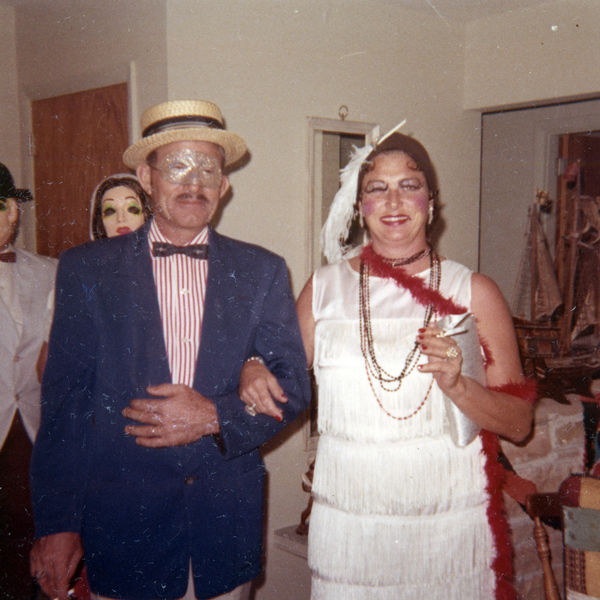 People in costume posing at a Koreshan Unity Halloween party.