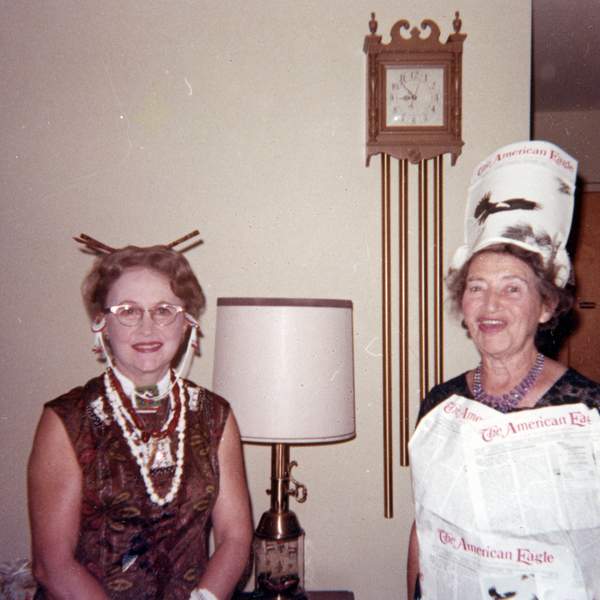 Koreshan Unity president Hedwig Michel, right, posing with woman at a Halloween party.