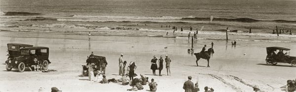 Postcard showing people on the Florida beach.