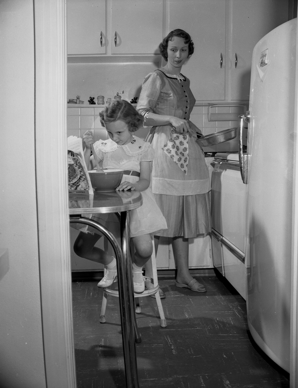 Jean Gatlin and daughter Margaret Ellen (age 5) in the kitchen in Tallahassee, Florida.