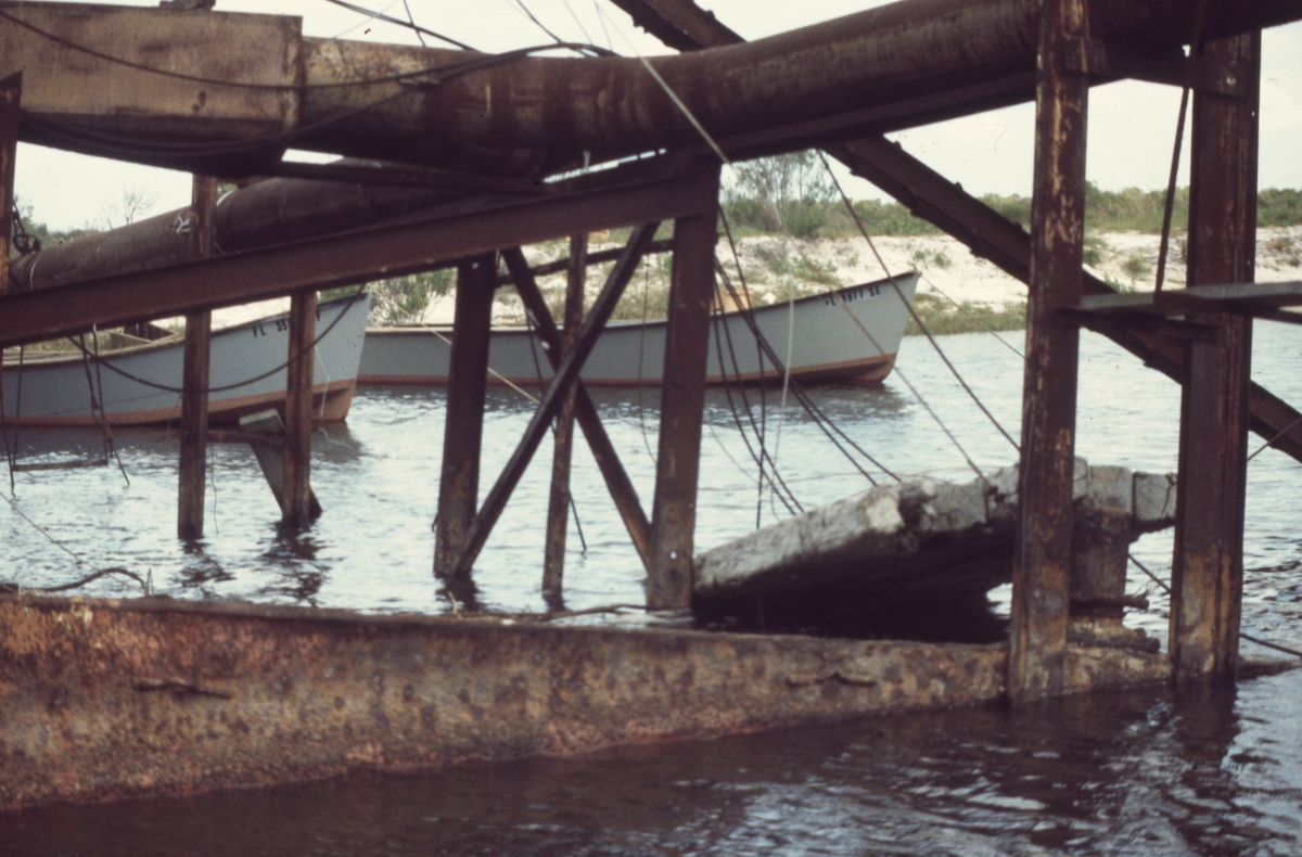 Close-up view showing storm damage to a structure at Alligator Point, Florida.
