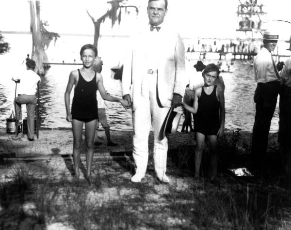 Governor John Martin and children at camp