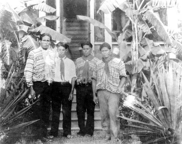 Seminole young men outside the mission