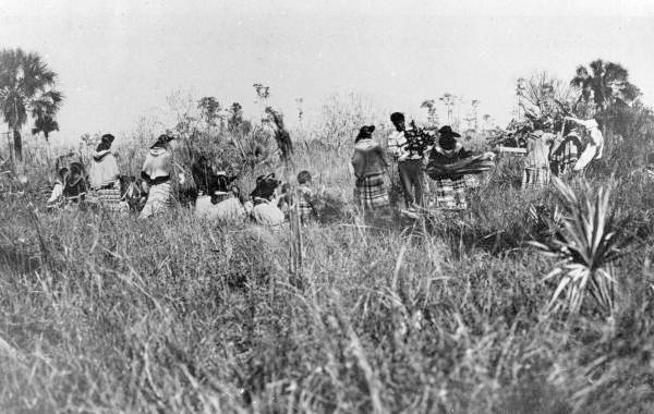 Mikasuki Indians building Christmas fires