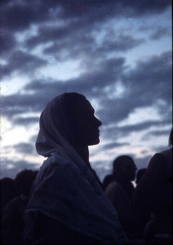 Silhouette of a girl at Mallory Square during Sunset Celebration - Key West, Florida.