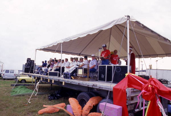 Man delivering speech during the SeaFest seafood festival in Port Canaveral, Florida.