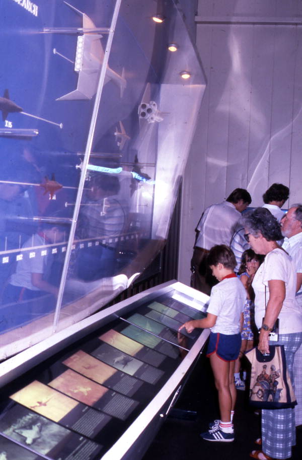 Visitors looking at museum exhibit at the Kennedy Space Center on Merritt Island near Titusville, Florida.