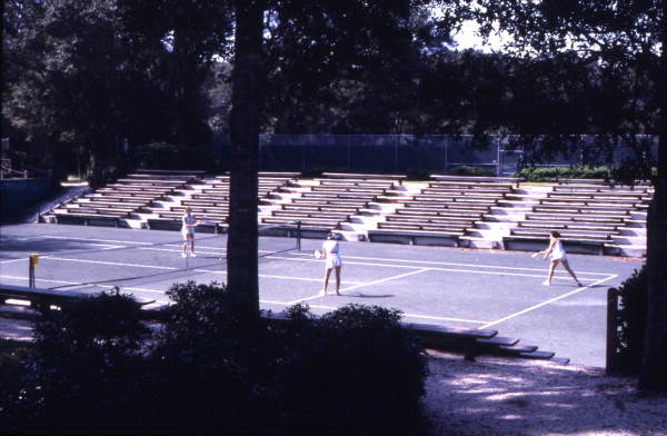 People playing tennis at the Amelia Island Plantation resort.