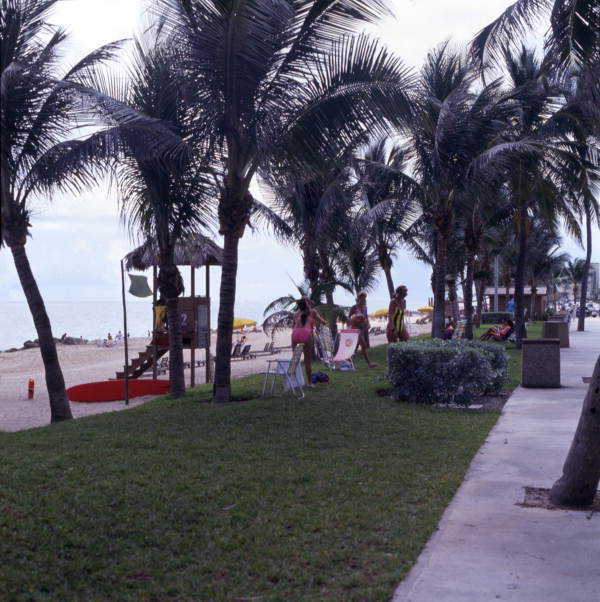 View showing a few beachgoers at Deerfield Beach, Florida.