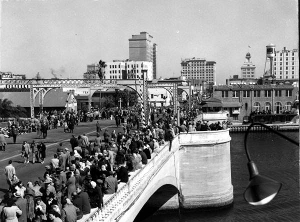 Large crowd awaiting the Gasparilla festival parade - Tampa, Florida.