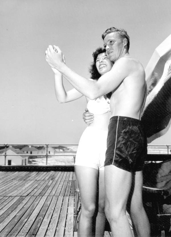 Peggy McCormick and Don Dalton dance together on Saint Augustine Beach