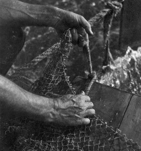 Getting shrimp net ready - Apalachicola, Florida