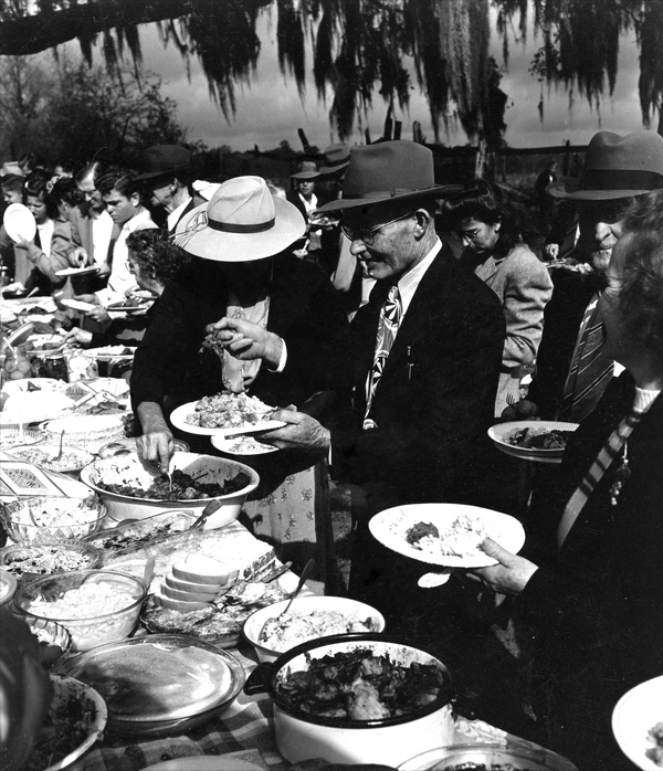 People enjoying bountiful servings at the Cracker Feast - Gilchrist County, Florida