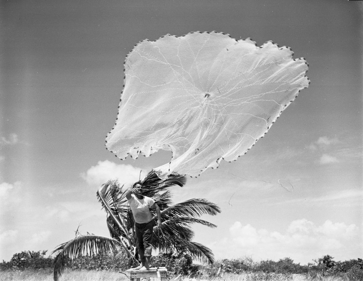 Bob Kyle casting his fishing net - Bahia Honda Key, Florida