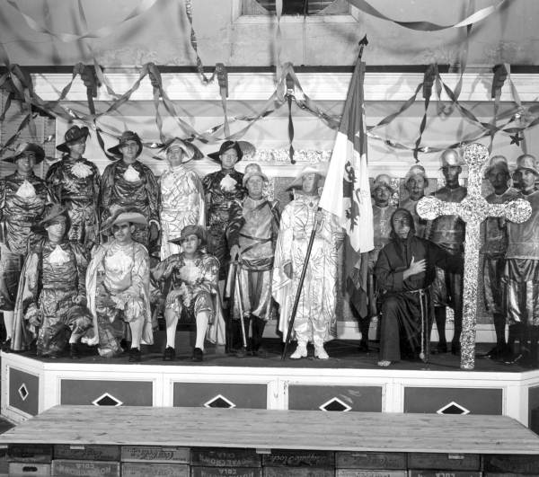Men in costume pose for a picture at the Fiesta of Five Flags party - Pensacola, Florida.