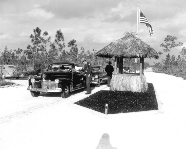 Automobiles at the entrance station to park - Everglades National Park, Florida.