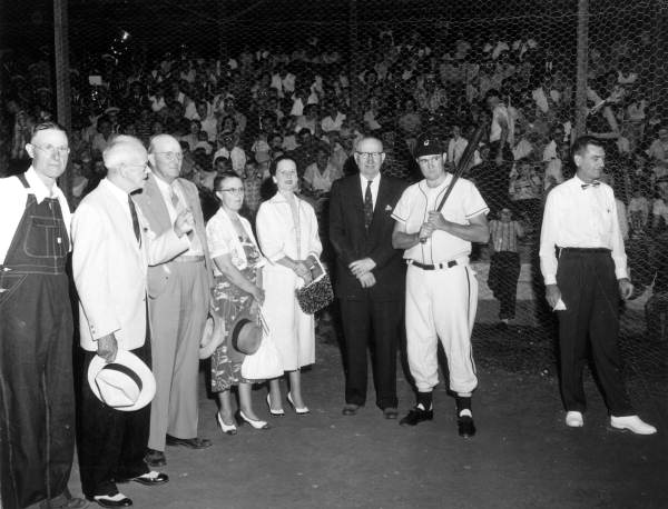 Neal Cobb, minor league batting champ with ball game attendees - Crestview, Florida
