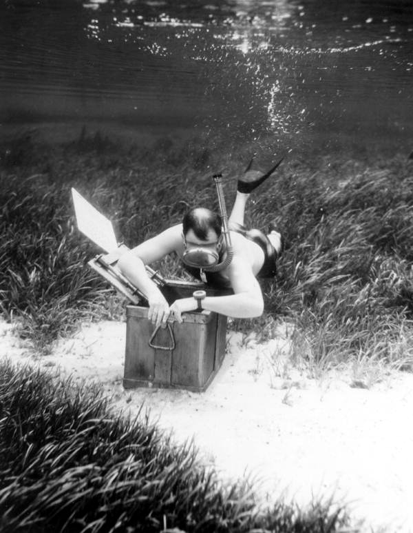 Unidentified swimmer checks out the treasure chest - Dunnellon, Florida