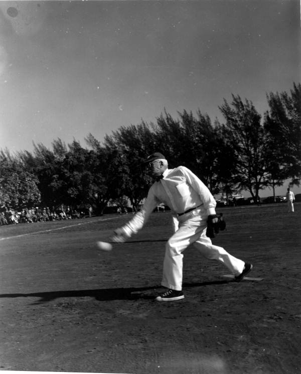 Man pitching in an over 75 softball group - Saint Petersburg, Florida.