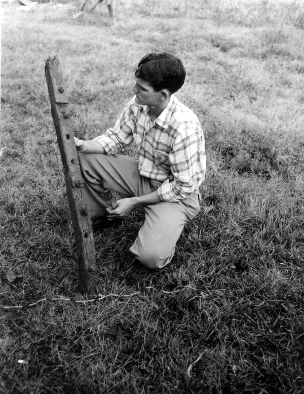 Raymond Taunton holds a ship's rib recovered from Goodin's Creek - Walton County, Florida