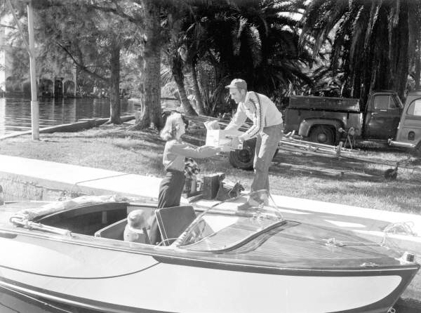 Unloading a small motorboat on the Saint Lucie Canal