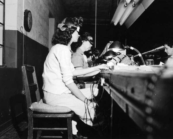 Mrs. Charlotte Miskinis and Mrs. Beatrice Frazier working at Johnson Electronics - Casselberry, Florida.