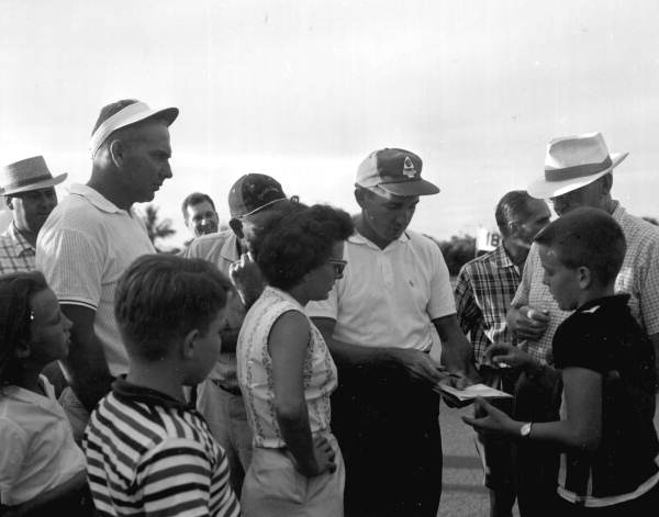 Unidentified golfer and autograph seekers - Naples, Florida