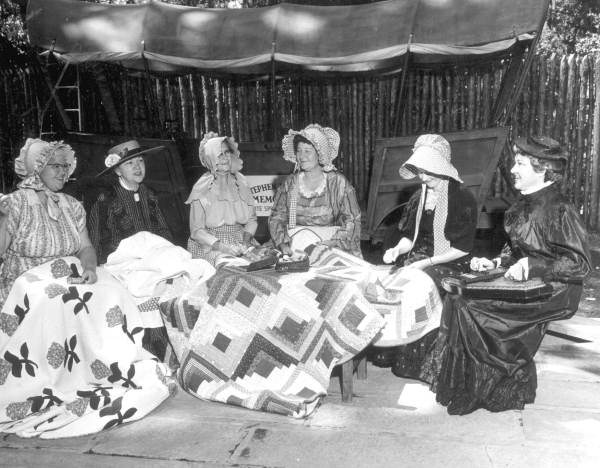 Mount Pleasant Home Demonstration Club members knitting quilts at the Florida Folk Festival