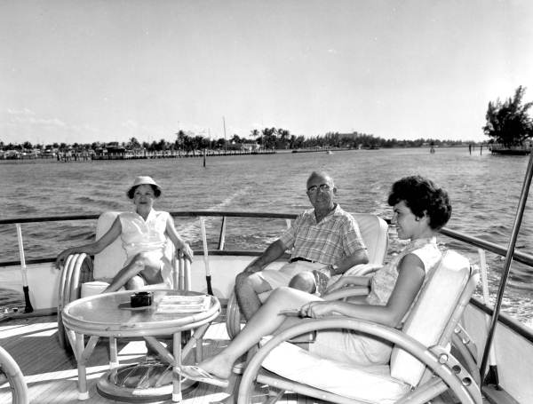 Lynn Genaria and Mr. and Mrs. T. Warren Smith aboard a yacht - Fort Lauderdale, Florida