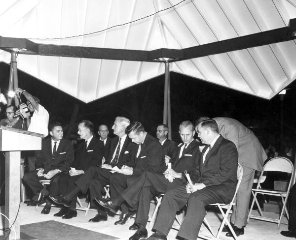 Several men gathered for the dedication of a fountain in the center of town - Lakeland, Florida